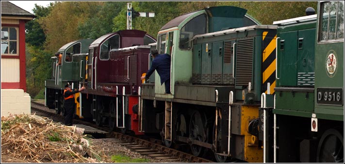  four class 14s head for Wansford with the man on the third one collecting the token 