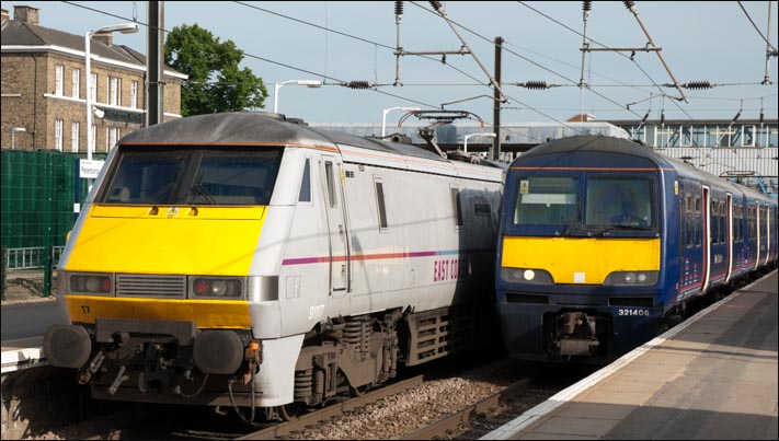 East Coast class 91117 in platform 2 and First Capital Connect class 312406 in platform 3 on the 17th of June 2013 East Coast class 91117 in platform 2 and First Capital Connect class 312406 in platform 3 on the 17th of June 2013