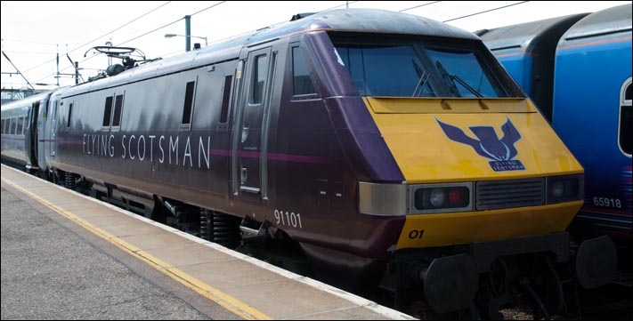 East Coast class 91101 with its Flying Scotsman logos on an up train in platform 2 at Peterborough on the 4th of June 2011 East Coast class 91101 with its Flying Scotsman logos on an up train in platform 2 at Peterborough on the 4th of June 2011