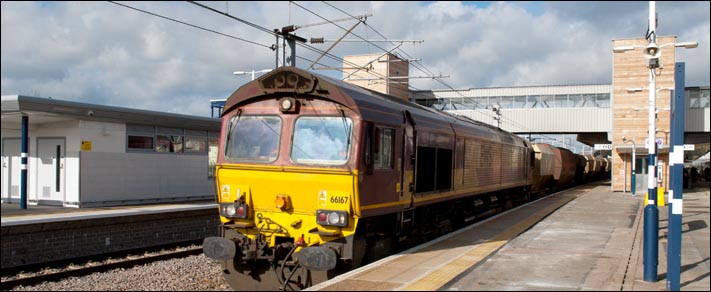  Class 66167 with a freight in platform 5 on the 21st of February 2014