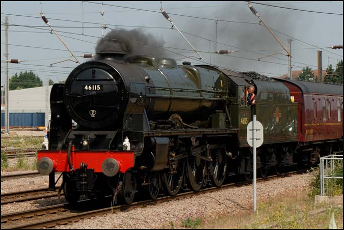Scots Guardsman on the up though line at Peterborough station on the 26th June 2010