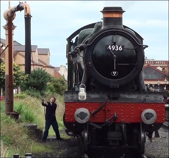 4936 is about to take water from the water crane at Kidderminster in 2013