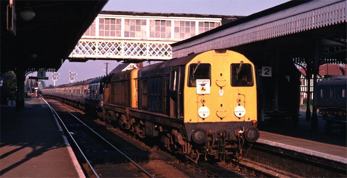 class 20s in Sleaford station with a Skegness (jolly fisherman?) sign on it.