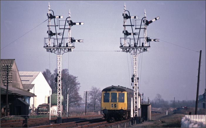 DMU to Shefield comes into Sleaford station past two fine signals