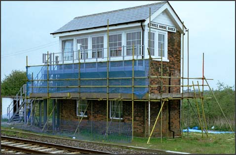 Work under way fitting the new windows to the Three Horse shoes box at Turves