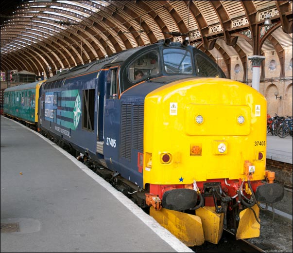 DRS class 37405 and the Inspection Saloon Caroline in York station DRS class 37405 and the Inspection Saloon Caroline in York station